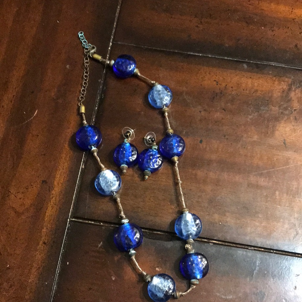 Costume Jewelry (one with Matching earrings.)